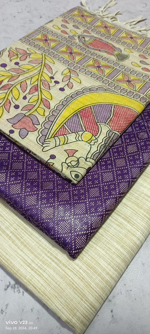 Three fabric samples with different patterns on a textured surface