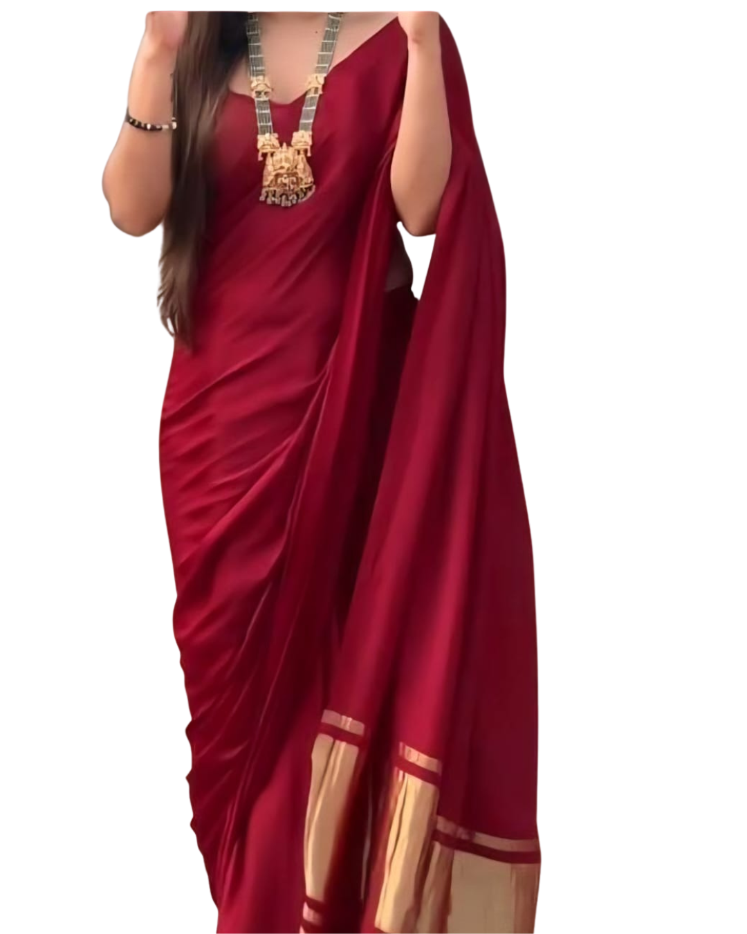 Red saree with gold border worn by a model on a white background