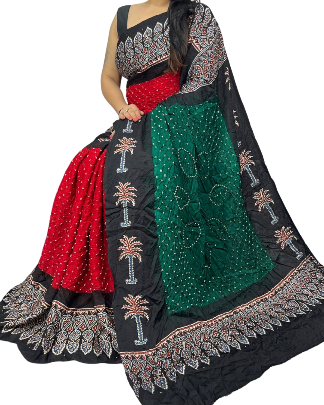 Traditional Indian saree with black, red, and green colors on a white background